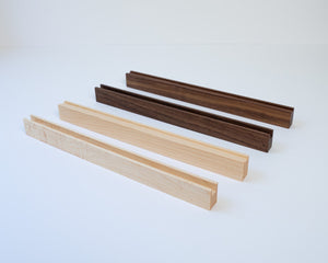 The Drop-In Record Display Shelf variants side by side. One set in Maple and one in Walnut hardwood so you can distinguish the difference in color between the two species. 